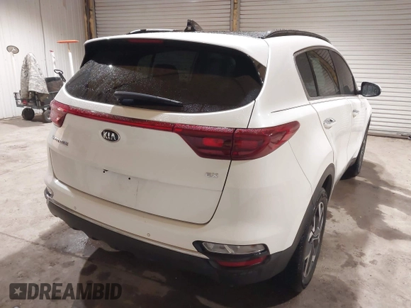 2020 Kia Sportage EX z VIN KNDPNCAC4L7802413, wystawiony jako IAAI lot #41921265 z przebiegiem 92 100 mil mil oraz . Historia ofert i sprzedaży dostępna na DreamBid. Obrazek 4.