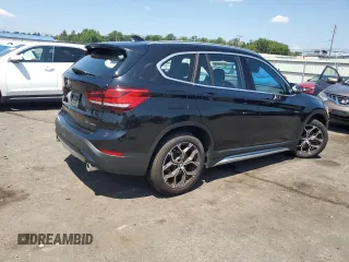 2021 BMW X1 xDrive28i with VIN WBXJG9C06M5S33201, listed as a Copart auction lot 66391015 with 53,395 mi miles and Salvage title. Bid and sale history available at DreamBid. Image 3.