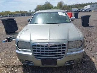 2005 Chrysler 300 with VIN 2C3AA63H65H522824, listed as a IAAI auction lot 42133787 with 266,724 mi miles. Bid and sale history available at carsss.com. Image 6.
