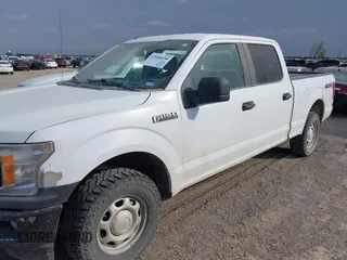 2019 Ford F-150 XL with VIN 1FTFW1E50KKC29711, listed as a IAAI auction lot 42086650 with 171,900 mi miles. Bid and sale history available at carsss.com. Image 16.