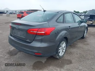 2017 Ford Focus SE z VIN 1FADP3F21HL205009, wystawiony jako IAAI lot #42305641 z przebiegiem 75 160 mil mil oraz . Historia ofert i sprzedaży dostępna na DreamBid. Obrazek 4.
