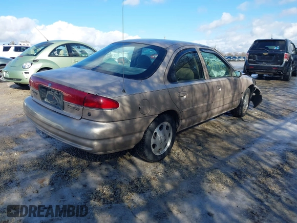 1999 Mercury Mystique GS z VIN 1MEFM6530XK635463, wystawiony jako IAAI lot #41478903 z przebiegiem 87 911 mil mil oraz . Historia ofert i sprzedaży dostępna na DreamBid. Obrazek 4.