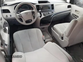 2014 Toyota Sienna L with VIN 5TDZK3DC3ES514520, listed as a Copart auction lot 52205295 with 71,402 mi miles and Salvage Title. Bid and sale history available at carsss.com. Image 8.