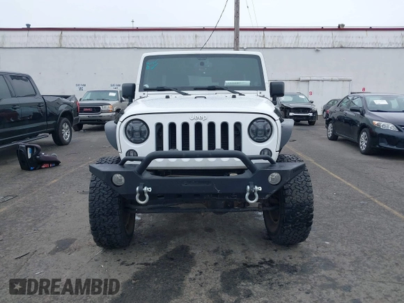 2014 Jeep Wrangler Unlimited Rubicon with VIN 1C4BJWFGXEL283929, listed as a IAAI auction lot 41812052 with 137,790 mi miles and . Bid and sale history available at DreamBid. Image 6.