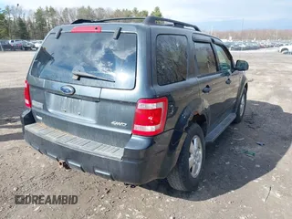 2008 Ford Escape XLT with VIN 1FMCU931X8KA86343, listed as a IAAI auction lot 42036419 with 146,836 mi miles. Bid and sale history available at carsss.com. Image 6.
