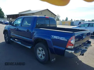 2015 Toyota Tacoma with VIN 3TMLU4ENXFM177755, listed as a IAAI auction lot 41867145 with 123,551 mi miles and . Bid and sale history available at DreamBid. Image 3.