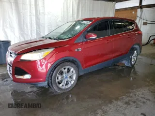 2013 Ford Escape SEL z VIN 1FMCU9H91DUB80012, wystawiony jako Copart lot #62870805 z przebiegiem 144 171 mil mil oraz Szkoda całkowita • Salvage title. Historia ofert i sprzedaży dostępna na DreamBid. Obrazek 1.
