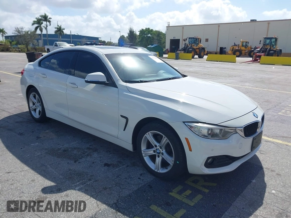 2015 BMW 4 Series 428i xDrive with VIN WBA4C9C56FG135520, listed as a IAAI auction lot 41574336 with 70,870 mi miles and . Bid and sale history available at carsss.com. Image 1.