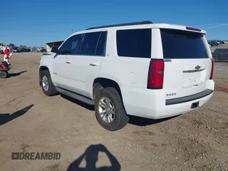 2015 Chevrolet Tahoe LT with VIN 1GNSCBKC0FR104096, listed as a IAAI auction lot 41679298 with 231,005 mi miles and . Bid and sale history available at DreamBid. Image 3.