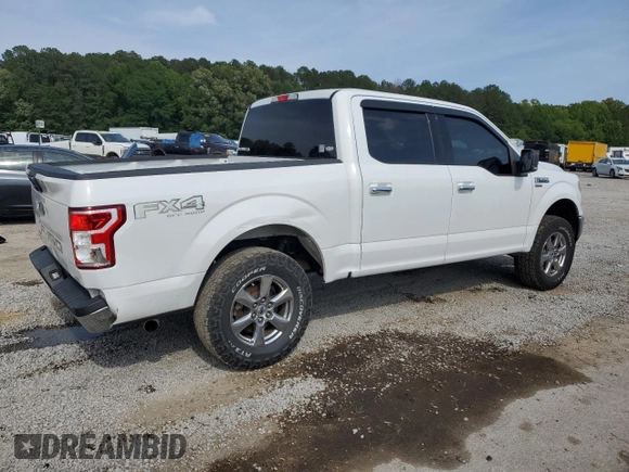 2018 Ford F-150 XL with VIN 1FTEW1E59JFA28036, listed as a Copart auction lot 57181525 with 121,384 mi miles and Salvage title. Bid and sale history available at DreamBid. Image 3.