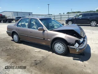 1991 Honda Accord z VIN 1HGCB7657MA200443, wystawiony jako Copart lot #67918464 z przebiegiem 94 601 mil mil oraz Szkoda całkowita • Salvage title. Historia ofert i sprzedaży dostępna na DreamBid. Obrazek 4.