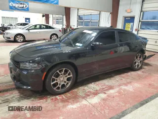 2015 Dodge Charger SXT with VIN 2C3CDXJG6FH884363, listed as a Copart auction lot 83520244 with 101,635 mi miles and Salvage Title. Bid and sale history available at carsss.com. Image 1.