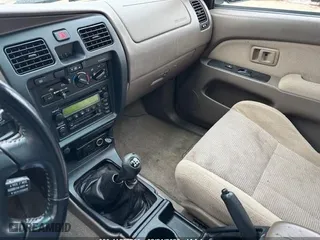 2000 Toyota 4Runner SR5 with VIN JT3HN86R2Y0263096, listed as a IAAI auction lot 41649205 with 284,195 mi miles. Bid and sale history available at carsss.com. Image 12.