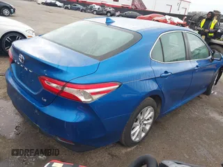 2020 Toyota Camry LE with VIN 4T1C11AK7LU324006, listed as a IAAI auction lot 41486878 with 76,290 mi miles. Bid and sale history available at carsss.com. Image 4.