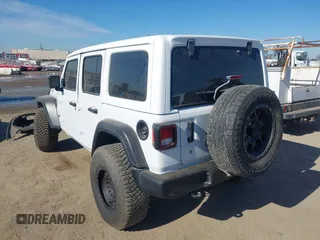 2023 Jeep Wrangler Willys with VIN 1C4HJXDG0PW638871, listed as a IAAI auction lot 42700599 with 16,171 mi miles and . Bid and sale history available at DreamBid. Image 3.