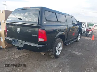 2015 Ram 1500 Outdoorsman z VIN 1C6RR7LT8FS653031, wystawiony jako IAAI lot #41581094 z przebiegiem 129 178 mil mil oraz . Historia ofert i sprzedaży dostępna na DreamBid. Obrazek 4.