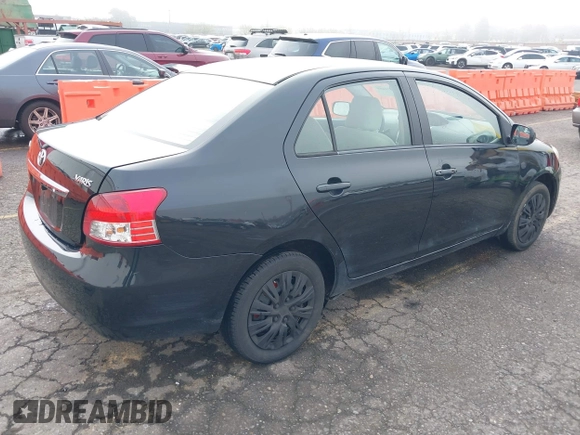 2008 Toyota Yaris with VIN JTDBT903284012329, listed as a IAAI auction lot 41879489 with 117,041 mi miles. Bid and sale history available at carsss.com. Image 4.