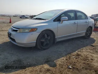 2006 Honda Civic LX with VIN 1HGFA16566L043654, listed as a Copart auction lot 45127345 with 235,800 mi miles and Salvage title. Bid and sale history available at DreamBid. Image 1.