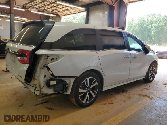 2021 Honda Odyssey Touring with VIN 5FNRL6H89MB018290, listed as a Copart auction lot 55183525 with 77,562 mi miles and Salvage title. Bid and sale history available at DreamBid. Image 3.