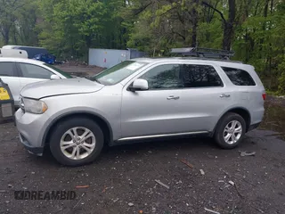2013 Dodge Durango Crew with VIN 1C4SDJDT8DC565608, listed as a IAAI auction lot 42181773 with 161,485 mi miles and . Bid and sale history available at DreamBid. Image 14.