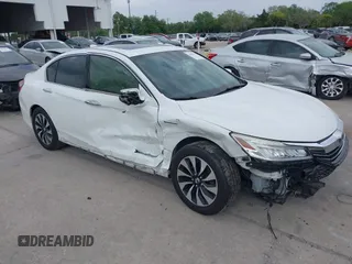 2017 Honda Accord Touring with VIN JHMCR6F79HC001571, listed as a IAAI auction lot 41861279 with 84,410 mi miles and . Bid and sale history available at DreamBid. Image 1.