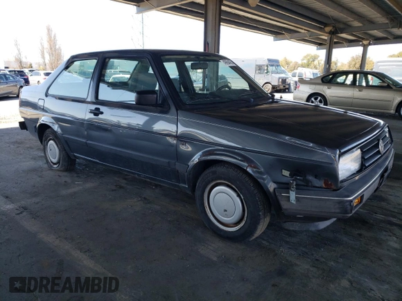 1989 Volkswagen Jetta z VIN WVWKB01G2KW684385, wystawiony jako Copart lot #49694065 z przebiegiem 63 792 mil mil oraz Czysty tytuł • Clean title. Historia ofert i sprzedaży dostępna na DreamBid. Obrazek 4.