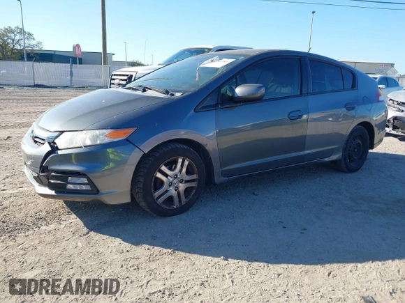 2012 Honda Insight LX with VIN JHMZE2H51CS003694, listed as a IAAI auction lot 41781384 with 154,685 mi miles and . Bid and sale history available at DreamBid. Image 18.