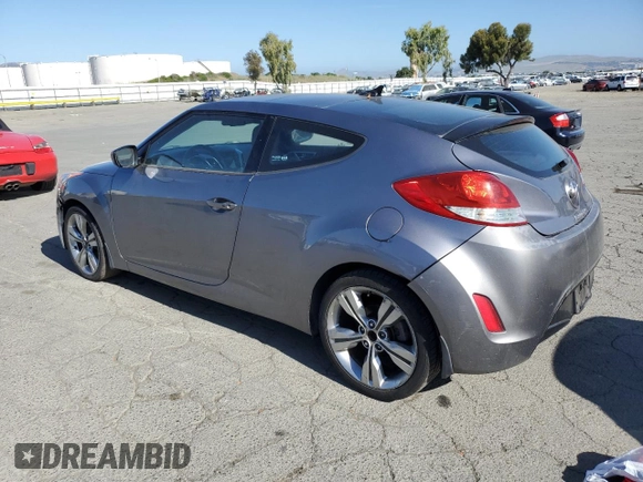 2012 Hyundai Veloster w/Gray Int z VIN KMHTC6AD9CU079542, wystawiony jako Copart lot #55998045 z przebiegiem 98 065 mil mil oraz Szkoda całkowita • Salvage title. Historia ofert i sprzedaży dostępna na DreamBid. Obrazek 2.
