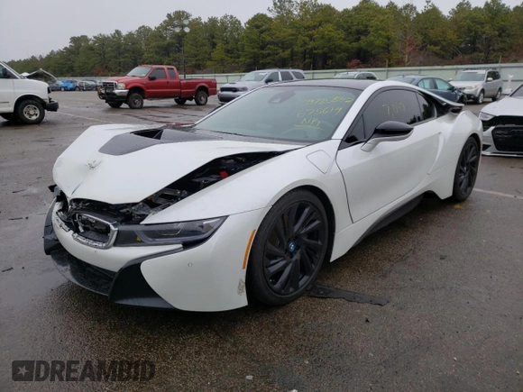 2016 BMW i8 z VIN WBY2Z2C52GV675619, wystawiony jako Copart lot #39725842 z przebiegiem 7047 mil mil oraz . Historia ofert i sprzedaży dostępna na DreamBid. Obrazek 2.