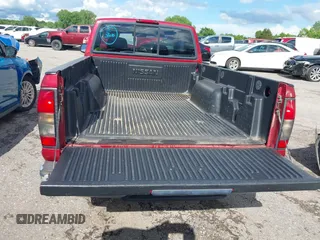 2001 Nissan Frontier XE z VIN 1N6DD26S31C354750, wystawiony jako IAAI lot #42213161 z przebiegiem 80 054 mil mil oraz . Historia ofert i sprzedaży dostępna na DreamBid. Obrazek 18.