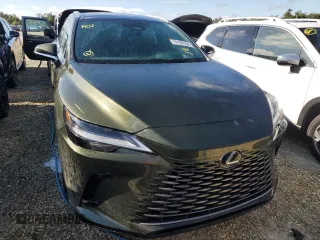 2023 Lexus RX with VIN 2T2BAMBA3PC001898, listed as a Copart auction lot 74104154 with 6,702 mi miles and Salvage Title. Bid and sale history available at carsss.com. Image 5.