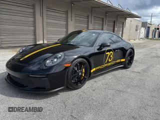 2019 Porsche 911 GT3 with VIN WP0AC2A97KS149212, listed as a Copart auction lot 46610435 with 2,806 mi miles and Salvage Title. Bid and sale history available at carsss.com. Image 2.