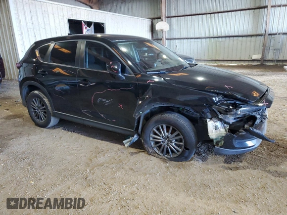 2017 Mazda CX-5 Sport with VIN JM3KFABL9H0210264, listed as a Copart auction lot 87918795 with 129,827 mi miles and Salvage Title. Bid and sale history available at carsss.com. Image 4.
