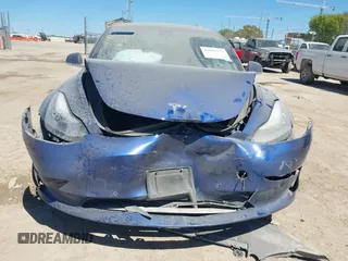 2020 Tesla Model 3 Standard Range Plus z VIN 5YJ3E1EA2LF739866, wystawiony jako IAAI lot #41842179 z przebiegiem 70 089 mil mil oraz . Historia ofert i sprzedaży dostępna na DreamBid. Obrazek 11.
