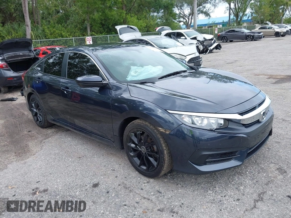 2016 Honda Civic Sedan LX with VIN 19XFC2F52GE069998, listed as a IAAI auction lot 42016233 with 93,990 mi miles. Bid and sale history available at carsss.com. Image 1.
