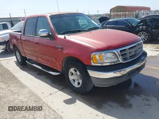 2002 Ford F-150 XLT with VIN 1FTRW07622KB40316, listed as a IAAI auction lot 41733874 with 120,242 mi miles. Bid and sale history available at carsss.com. Image 1.