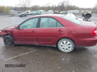 2004 Toyota Camry LE with VIN 4T1BE32K04U314445, listed as a IAAI auction lot 42017413 with 137,702 mi miles. Bid and sale history available at carsss.com. Image 15.