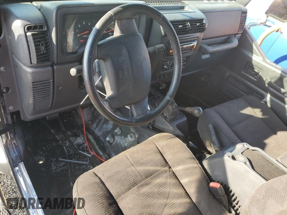2003 Jeep Wrangler X with VIN 1J4FA39S73P340698, listed as a Copart auction lot 73888624 with 49,677 mi miles and Salvage Title. Bid and sale history available at carsss.com. Image 8.