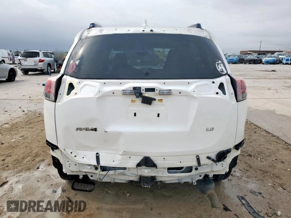 2016 Toyota RAV4 LE with VIN JTMZFREV3GJ088139, listed as a Copart auction lot 51243455 with 130,819 mi miles and Salvage Title. Bid and sale history available at carsss.com. Image 6.