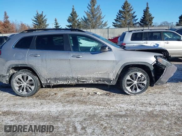 2022 Jeep Cherokee Limited z VIN 1C4PJMDX4ND513178, wystawiony jako IAAI lot #41636443 z przebiegiem 59 635 mil mil oraz . Historia ofert i sprzedaży dostępna na DreamBid. Obrazek 13.