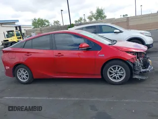 2017 Toyota Prius Plus with VIN JTDKARFP5H3061952, listed as a IAAI auction lot 42217235 with 148,343 mi miles and . Bid and sale history available at DreamBid. Image 14.