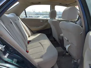 1999 Honda Accord LX with VIN 1HGCG6654XA145126, listed as a IAAI auction lot 42090873 with 76,421 mi miles and . Bid and sale history available at DreamBid. Image 8.