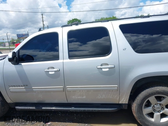 2012 Chevrolet Suburban LT z VIN 1GNSCJE01CR143982, wystawiony jako IAAI lot #42257552 z przebiegiem 202 973 mil mil oraz . Historia ofert i sprzedaży dostępna na DreamBid. Obrazek 14.