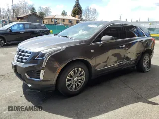 2019 Cadillac XT5 Luxury AWD with VIN 1GYKNDRS0KZ229941, listed as a Copart auction lot 49457315 with 48,856 mi miles and Salvage Title. Bid and sale history available at carsss.com. Image 1.