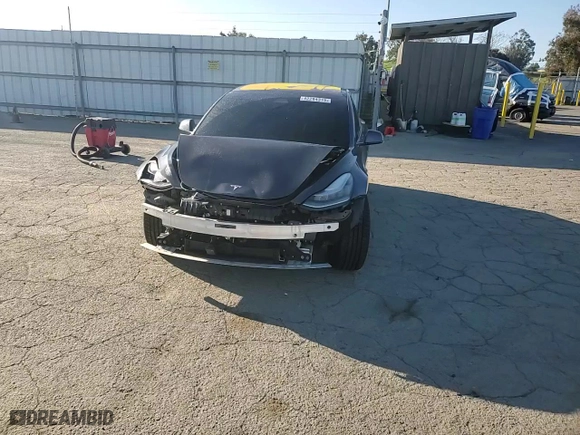 2018 Tesla Model 3 Long Range Battery with VIN 5YJ3E1EB1JF129107, listed as a Copart auction lot 42284315 with 128,257 mi miles and Salvage Title. Bid and sale history available at carsss.com. Image 10.