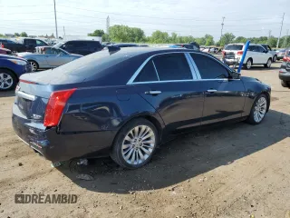 2015 Cadillac CTS Luxury AWD with VIN 1G6AX5SX7F0125516, listed as a Copart auction lot 61072735 with 111,448 mi miles and Clean title. Bid and sale history available at DreamBid. Image 3.