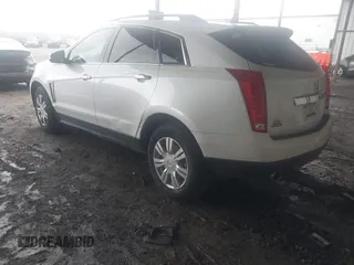 2014 Cadillac SRX z VIN 3GYFNAE32ES580480, wystawiony jako IAAI lot #42170765 z przebiegiem 148 245 mil mil oraz . Historia ofert i sprzedaży dostępna na DreamBid. Obrazek 3.