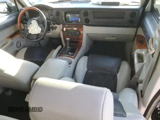 2007 Jeep Commander Overland with VIN 1J8HG68217C619277, listed as a Copart auction lot 82934414 with 136,282 mi miles and Salvage title. Bid and sale history available at DreamBid. Image 8.