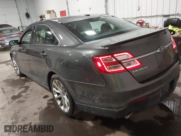 2015 Ford Taurus Limited with VIN 1FAHP2J86FG106828, listed as a IAAI auction lot 41748997 with 221,216 mi miles. Bid and sale history available at carsss.com. Image 3.