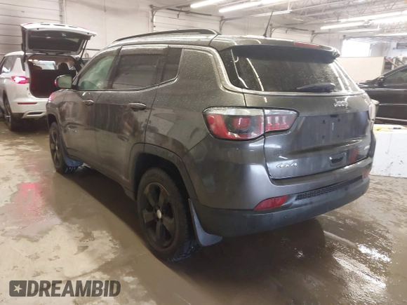 2018 Jeep Compass Altitude with VIN 3C4NJDBB6JT187581, listed as a IAAI auction lot 41542689 with 126,147 mi miles and . Bid and sale history available at carsss.com. Image 3.